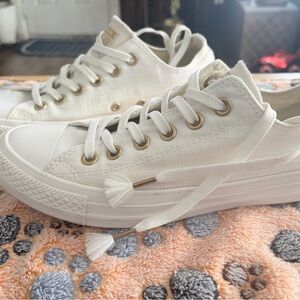 Stylish White Canvas Sneakers with Gold Details